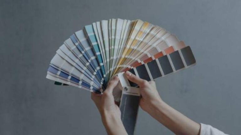 Person holding color samples